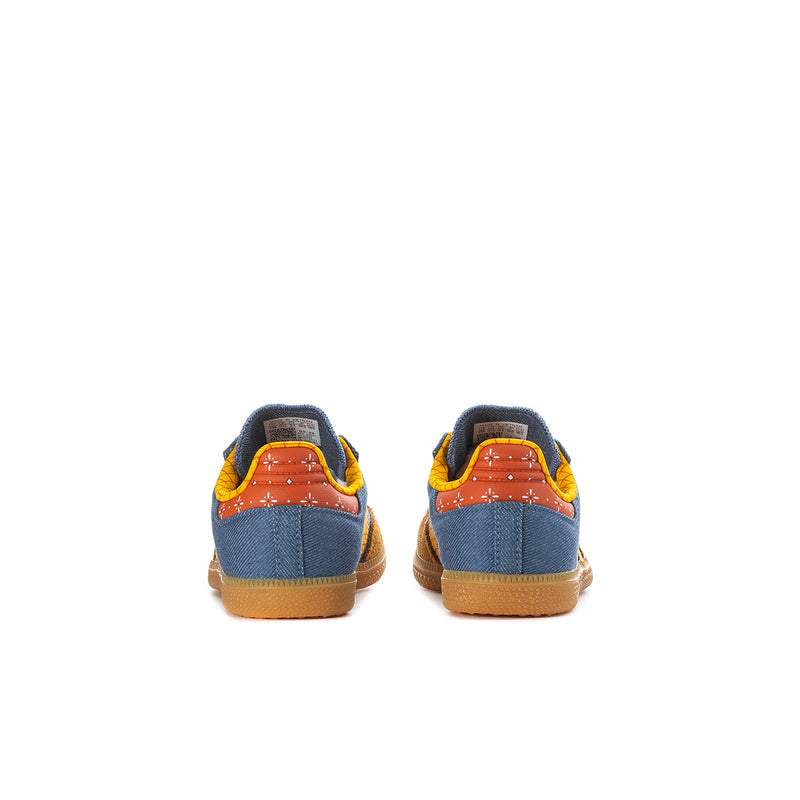 Kids sneakers heel view: blue suede with orange/yellow accents and gum outsole