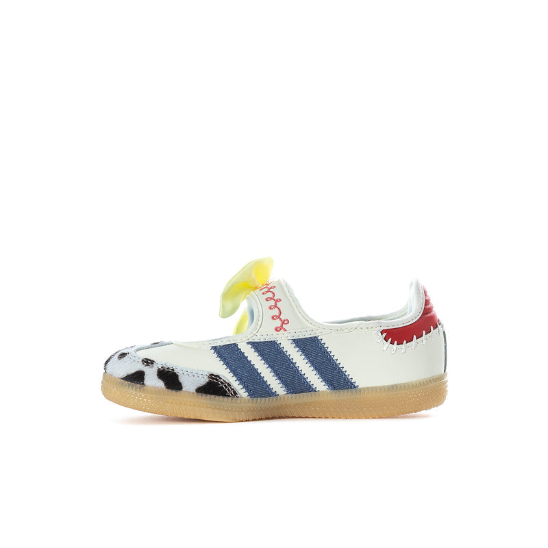 Kids sneakers front view: white upper, blue three-stripe panels, cow-print toe, yellow bow