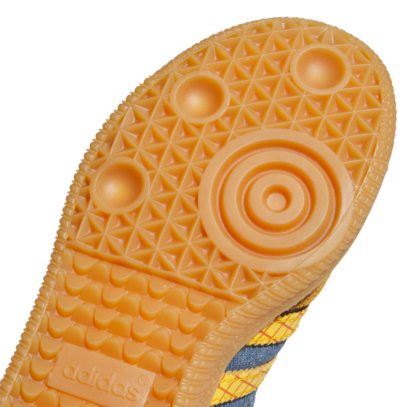 Kids outsole close-up with adidas logo and textured gum tread