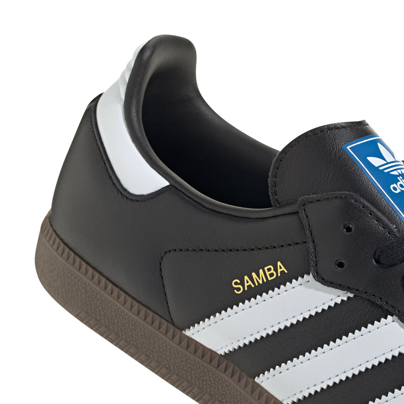 Black adidas Samba OG heel with white zigzag stripes, “Samba” branding, and gum sole.