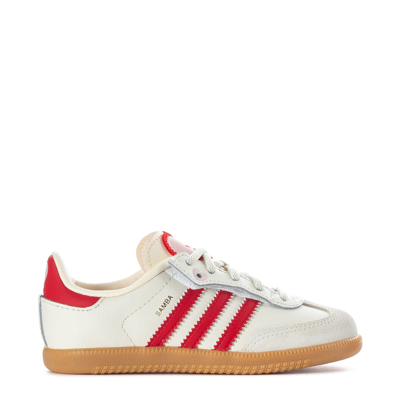 Toddler sneakers in cream with red stripes and gum rubber sole