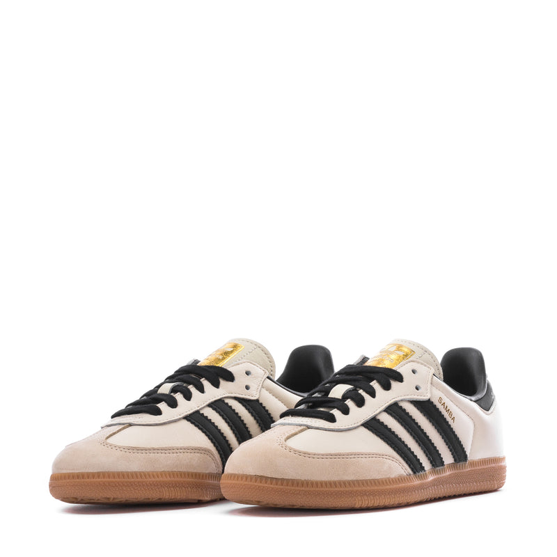 Pair of women's Samba OG sneakers, cream leather with black laces and gum soles
