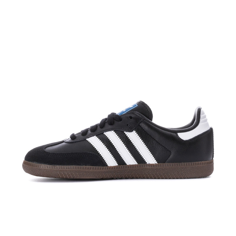Black adidas low-top sneaker with white stripes and lace-up front, side view