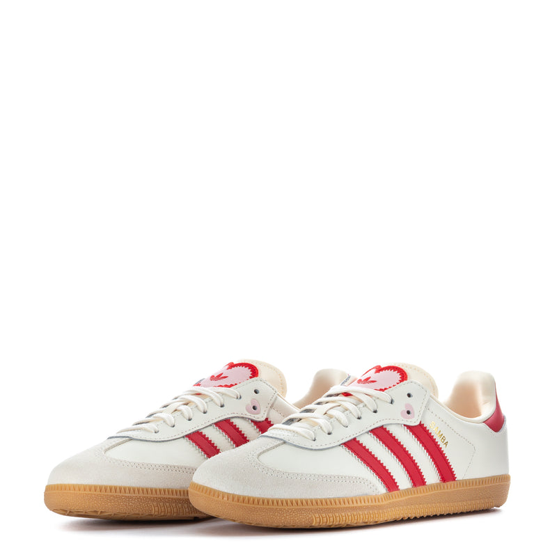 Pair of youth adidas Samba OG sneakers in cream with red stripes and gum bottoms