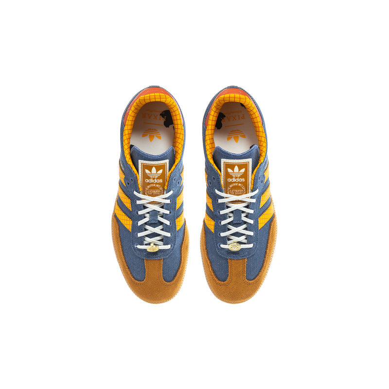 Pair of denim and yellow sneakers showing tongue labels, laces, and interior.