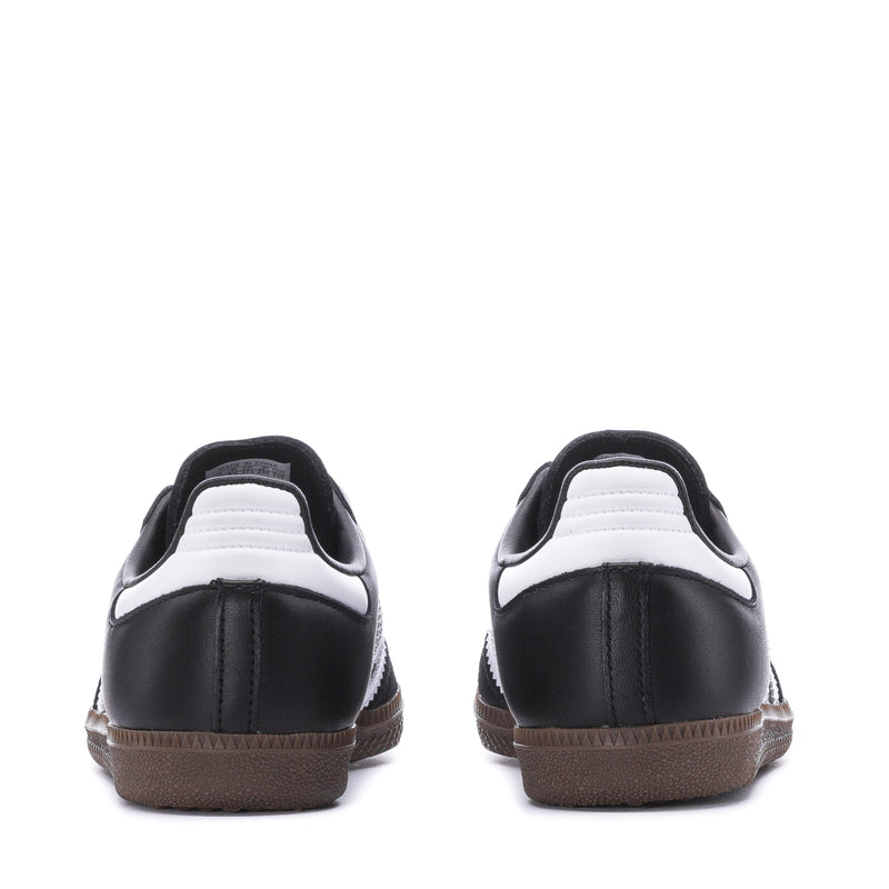 Kids' black Samba OG sneakers with white heel tabs and brown gum heels