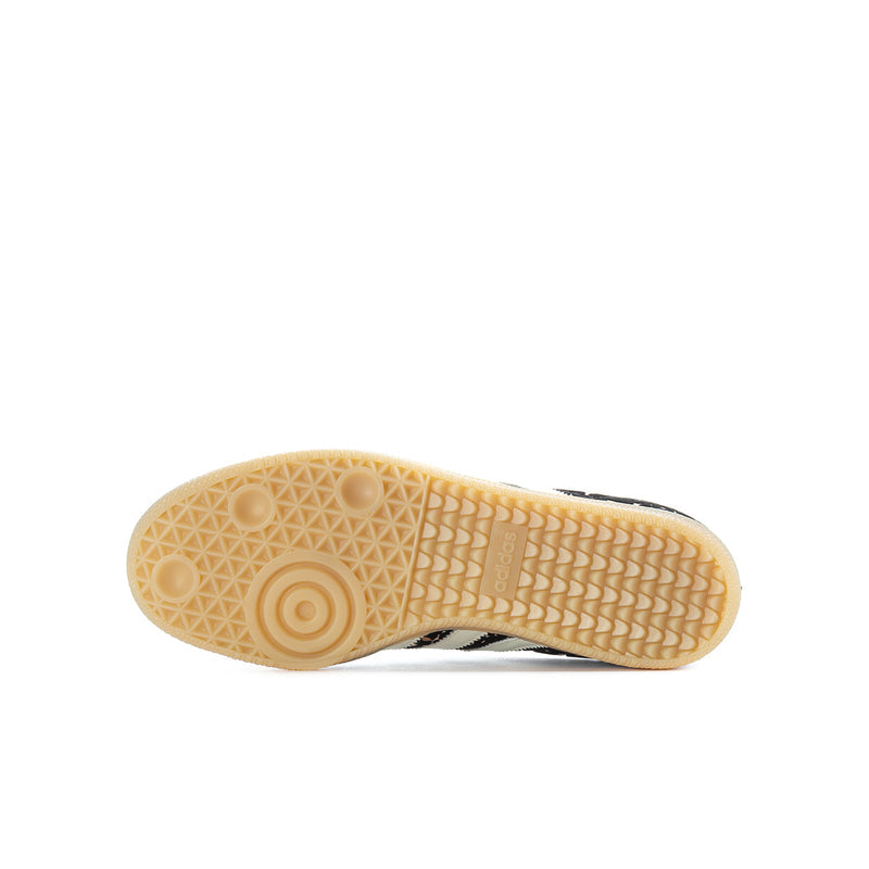 Youth sneaker outsole with light tan traction pattern and circular tread details