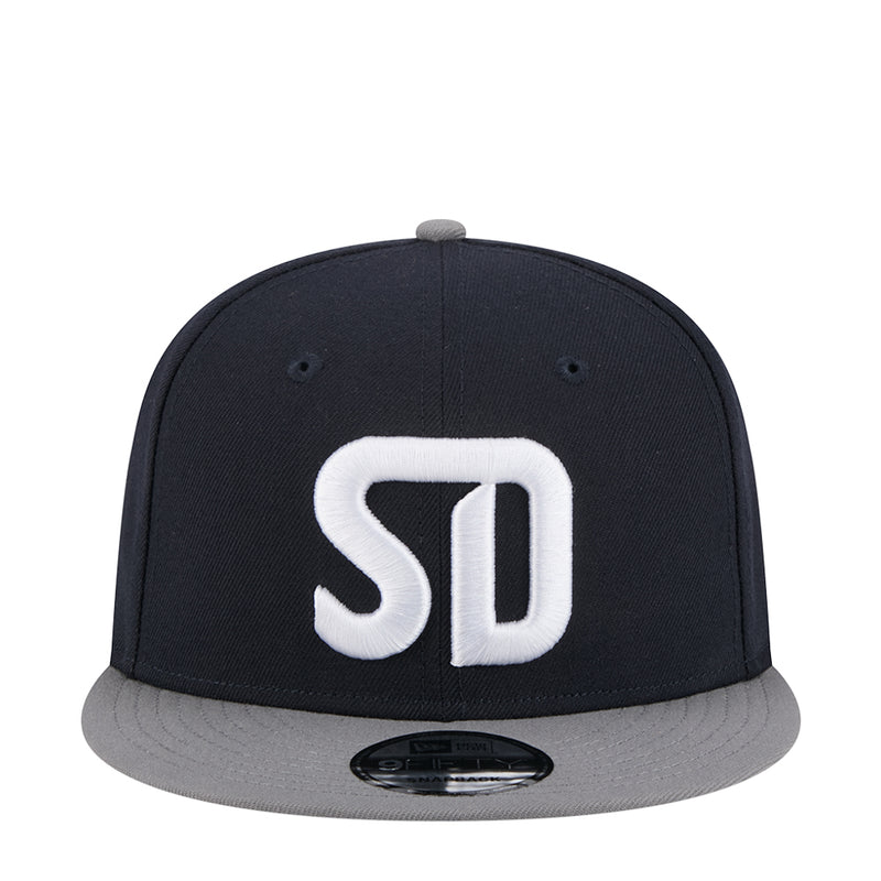 Two-tone snapback cap with large white SD logo on dark crown and gray brim