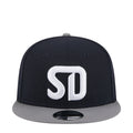 Two-tone snapback cap with large white SD logo on dark crown and gray brim