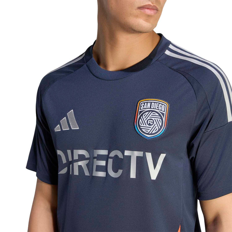 Men's navy replica home soccer jersey close-up with DIRECTV sponsor and club crest