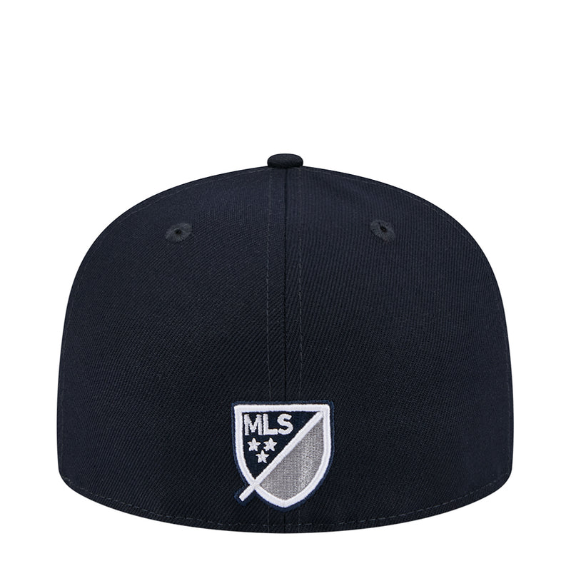 Dark navy cap with MLS shield patch on front, flat brim
