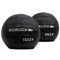 Two black Medicine Ball Bundle sandbags labeled 100 and 80 sit side by side on a white background, ideal for home gyms or portable training sessions.