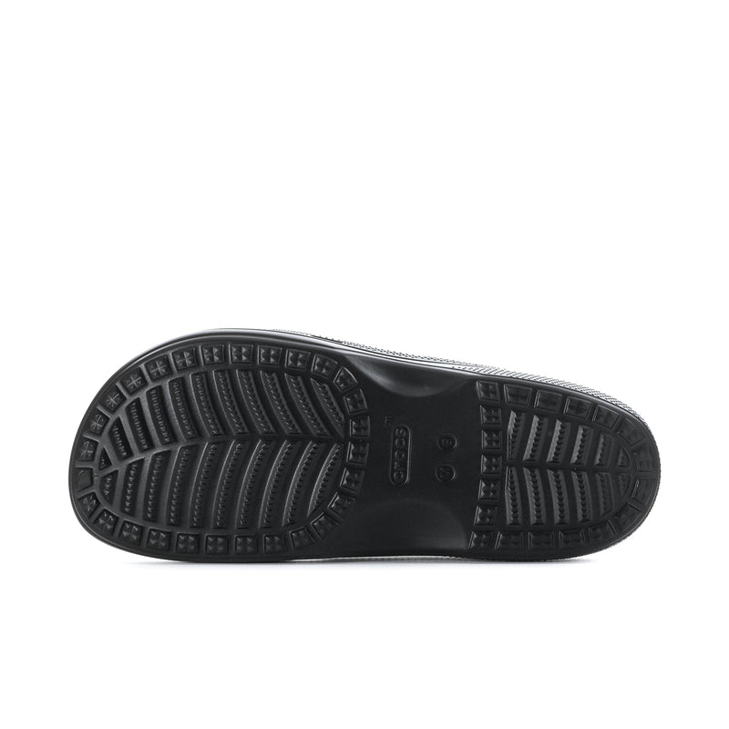 Men's black slide sandal outsole with textured tread for grip