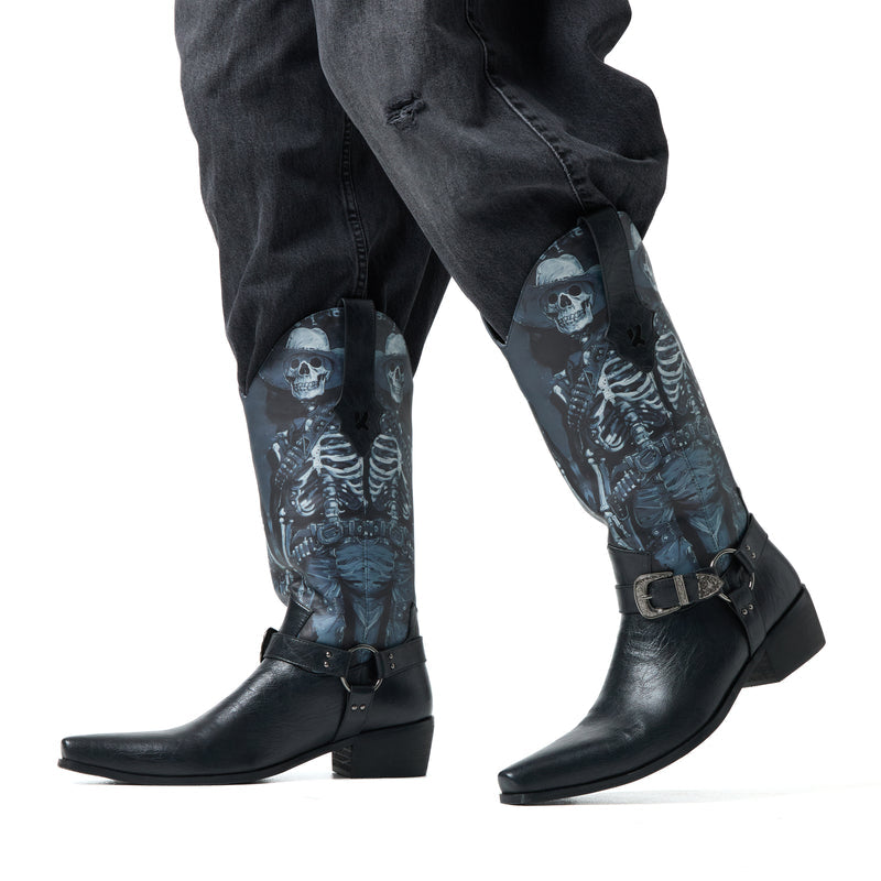 Black leather boots with skeleton and skull patterned gaiters on a white background