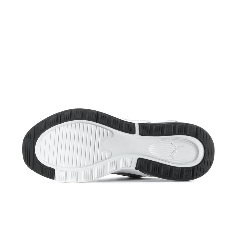 Puma sneakers outsole view in grey and white, with black tread pattern
