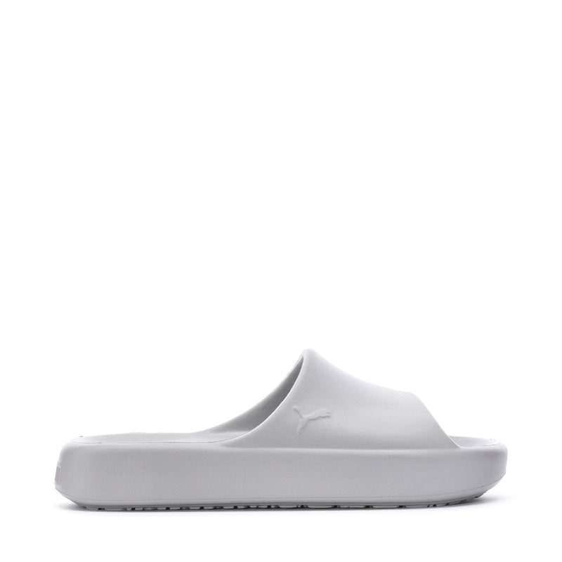 Youth slide sandals in light gray with PUMA cat logo on strap.