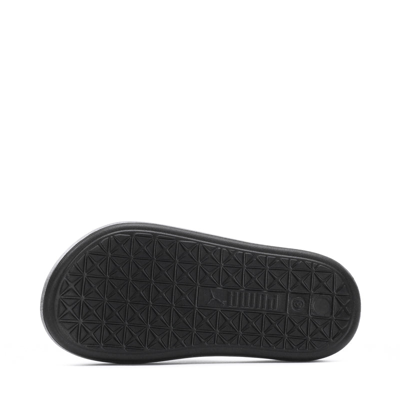 Youth slide sandal outsole tread, black rubber with geometric pattern