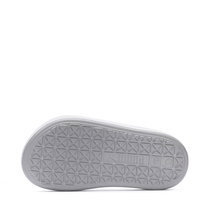 Youth slide sandal outsole in light gray with geometric tread pattern.