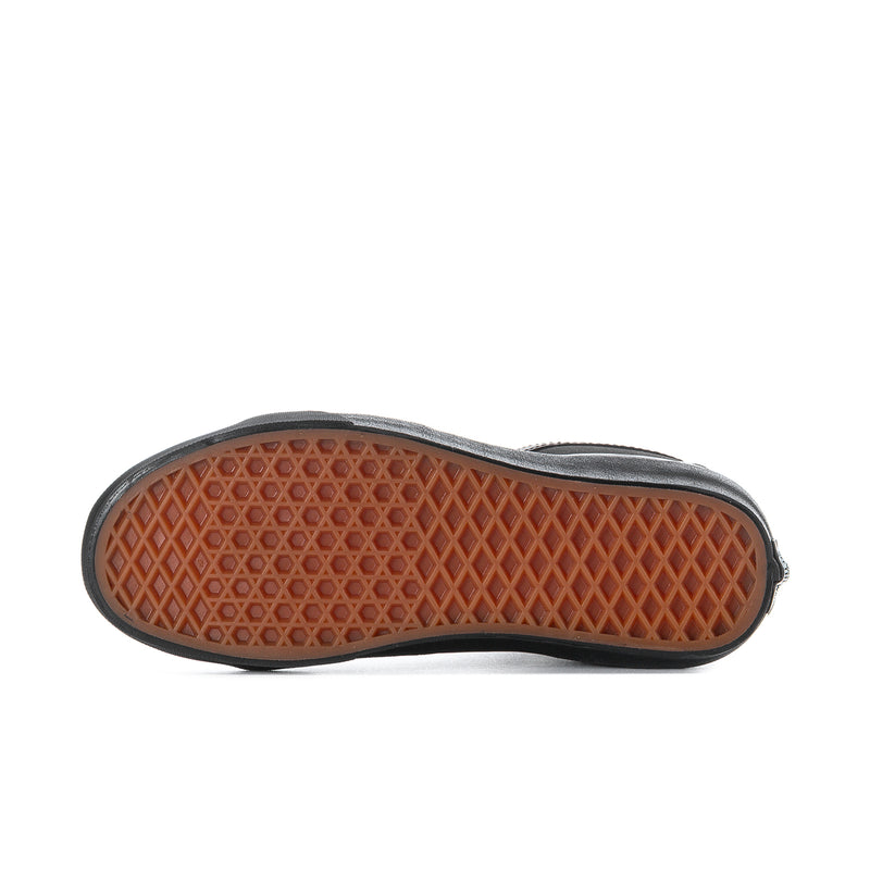 Men's black high-top sneaker outsole with diamond-pattern tread