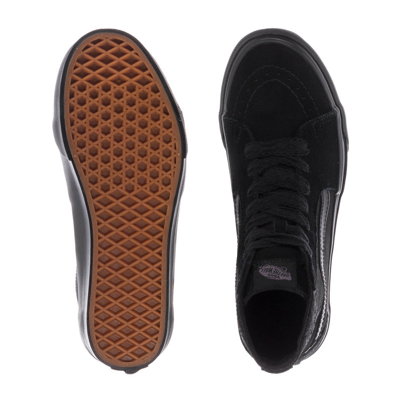 Black high-top sneakers showing brown outsole tread and inner side, lace-up