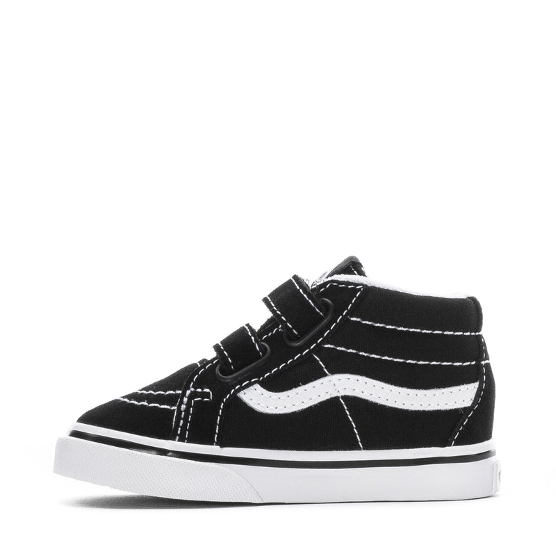 Black and white toddler mid-top sneakers with hook-and-loop straps and white piping