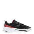 Youth black sneakers with red accents, cushioned white sole, and side S logo