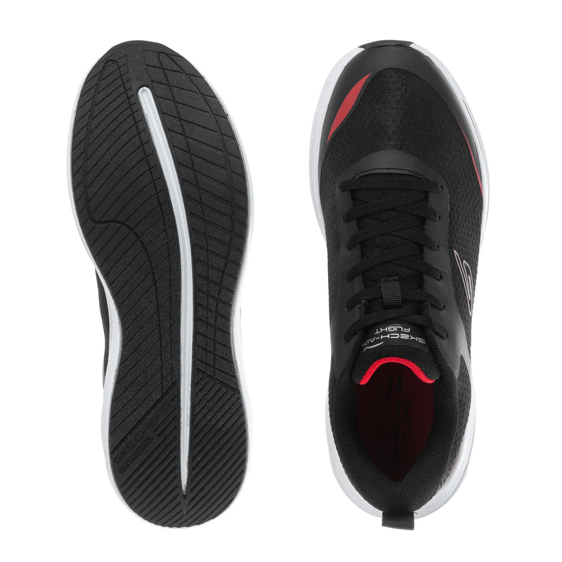 Youth sneaker outsoles and heel view, black rubber tread with red accent trim