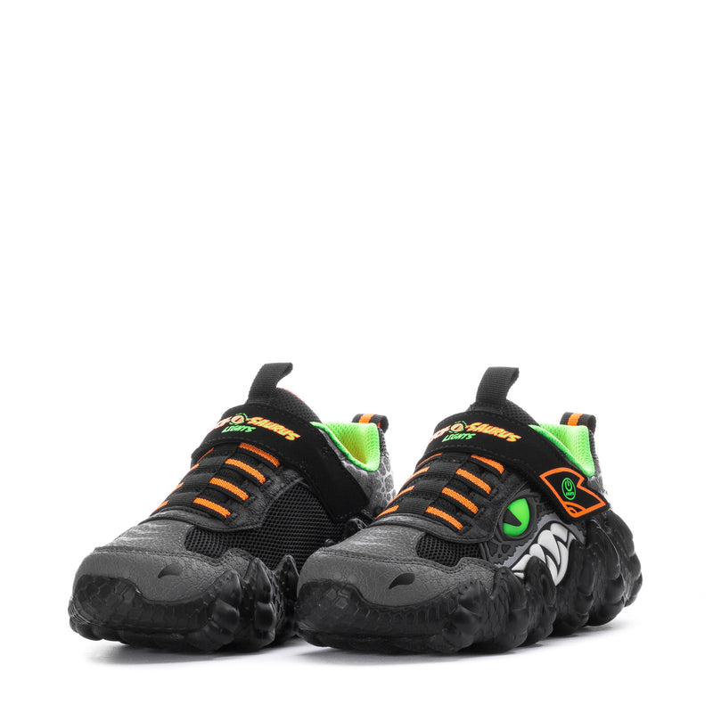 Kids black sneakers with lime green collar, orange laces, and dinosaur logo