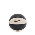 Mini basketball with black and pale ivory panels, Nike swoosh on center