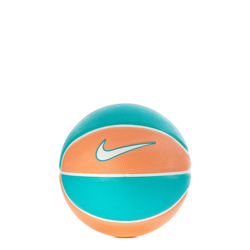 Mini basketball in teal and apricot with white stripe and Nike swoosh logo