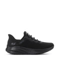 Black lace-up sneakers with knit upper and chunky textured rubber sole, side view