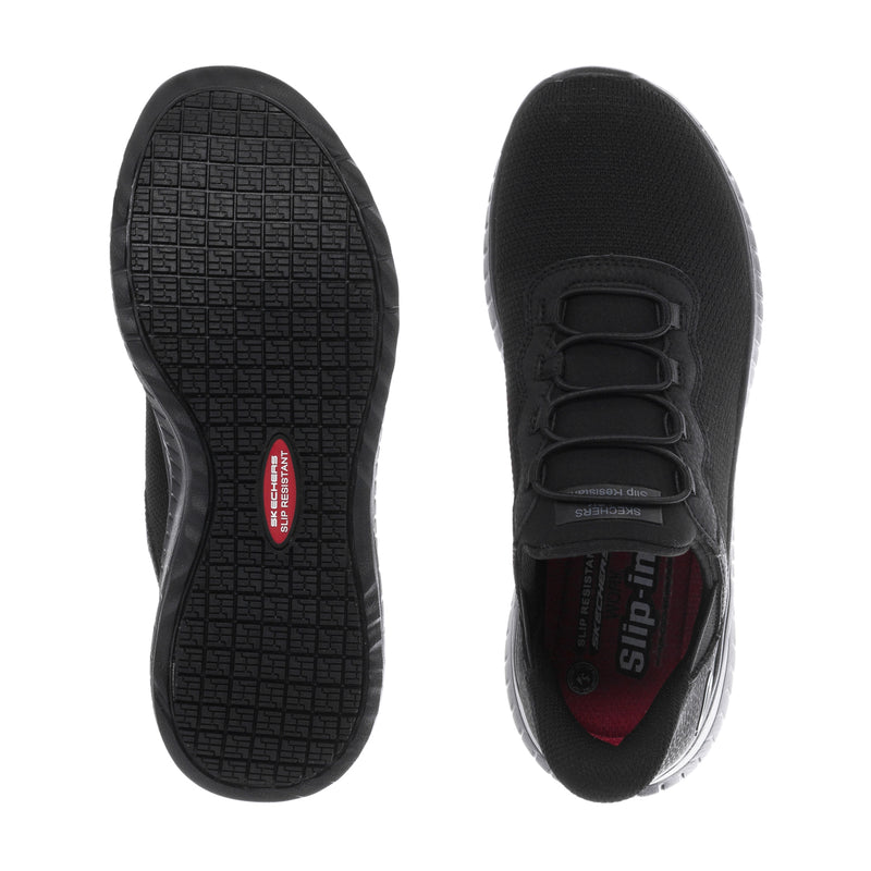 Black sneakers showing treaded outsole and padded collar at the lace-up opening