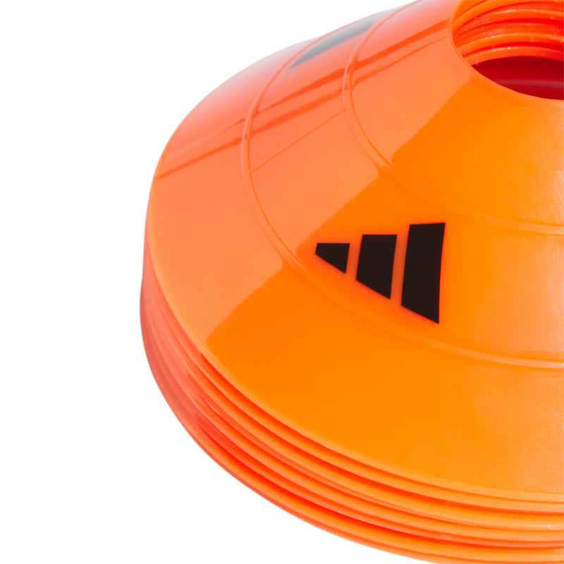Orange soccer training cone top with black mark and stacked base rim