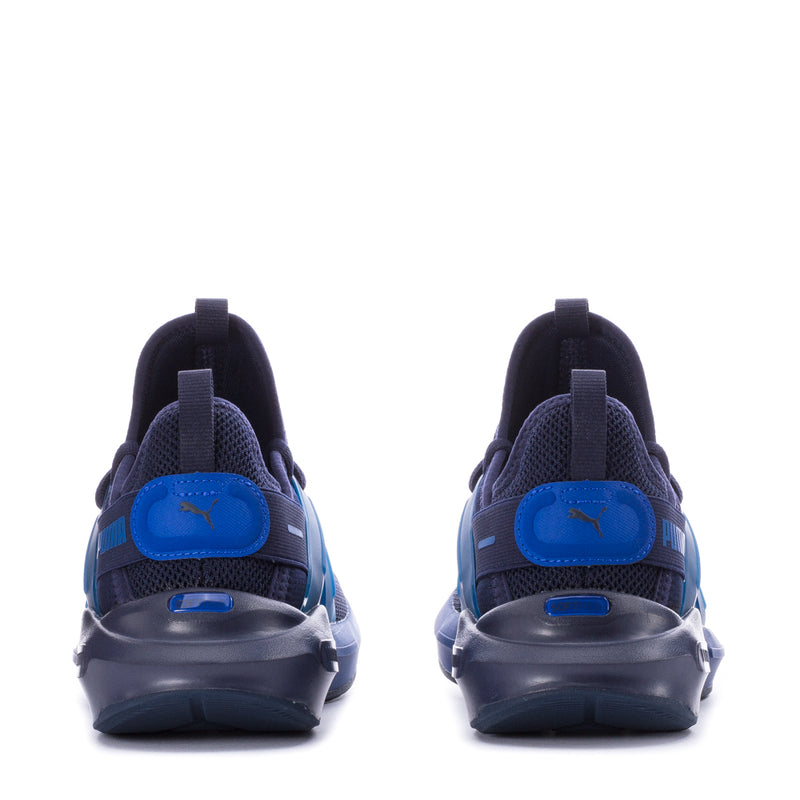 Youth sneakers back view in navy with blue heel details and Puma logo