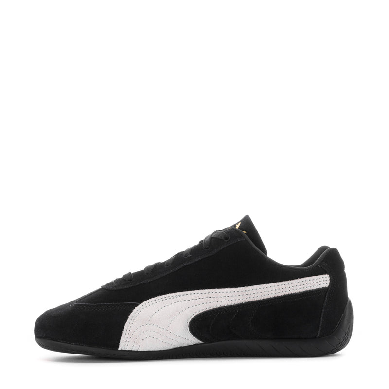 Puma women's low-top sneakers, black suede upper with white stripe and side logo