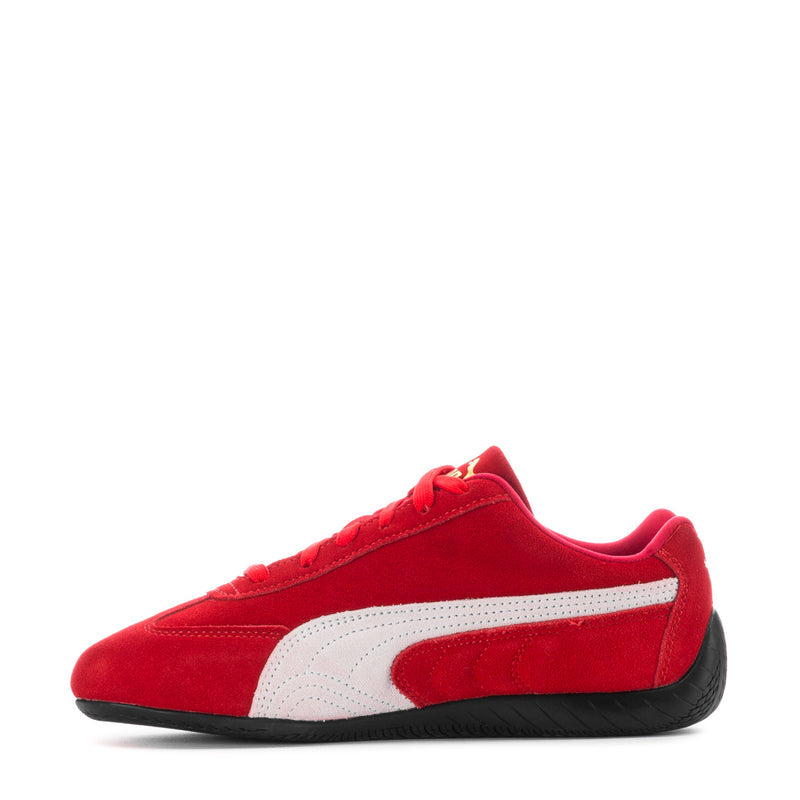 Red and white low-top women's sneaker, side stripe and lace-up front