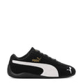 Youth black and white Puma sneakers with white mid-panel and Puma cat logo