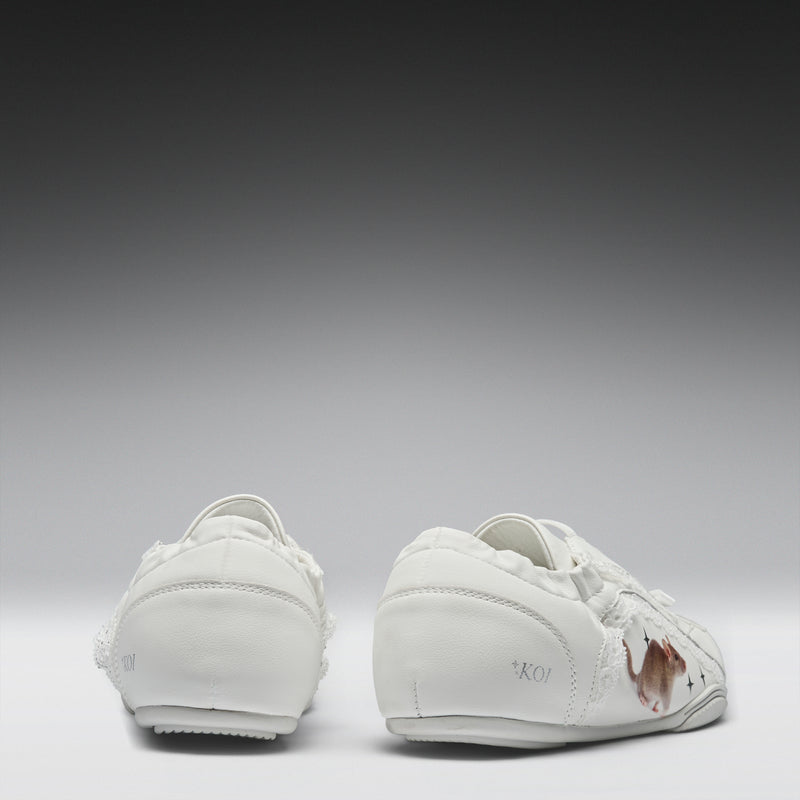 White sneakers on a gray background