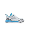 Kids low-top sneaker in white with university blue accents and grey patterned toe