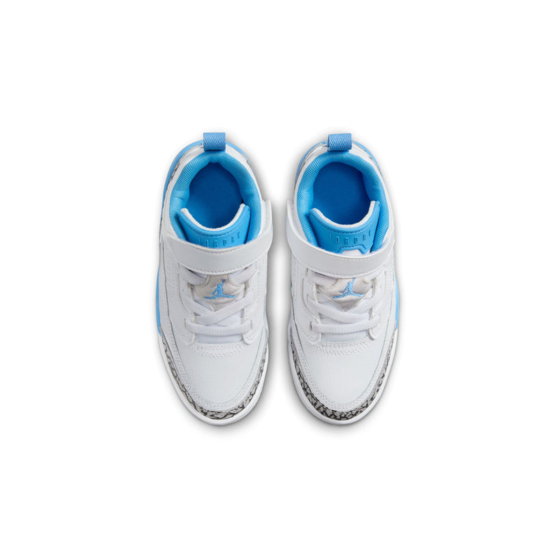Kids low-top sneaker pair, white uppers with blue inner lining and lace-up front