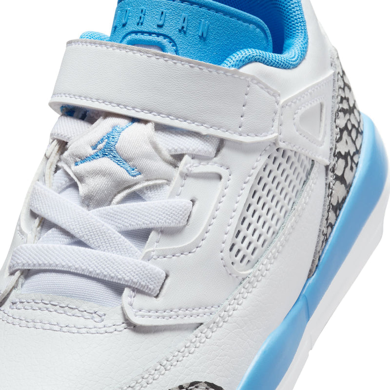 Kids sneaker close-up: white mesh panel, lace-up front, and blue heel collar