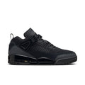 Black low-top men’s sneaker with lace-up, mesh panels, and molded heel detail