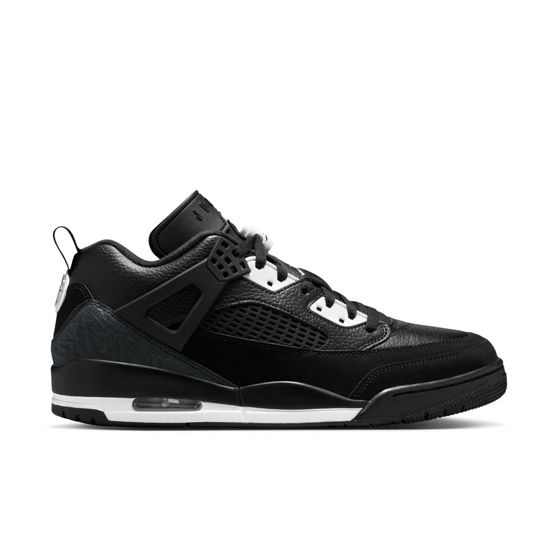 Men's black low-top sneakers in profile, black mesh and leather panels with white accents.