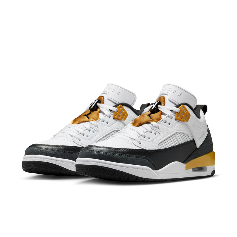 Men's low-top sneakers, side view: white uppers with black panels and metallic gold accents.