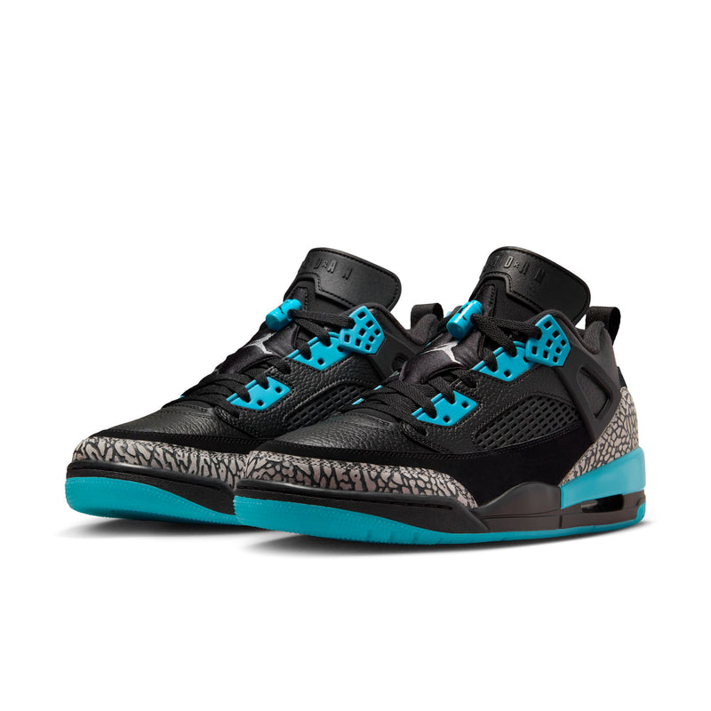 Men's low-top sneakers, black upper with turquoise lace hardware and speckled toe.