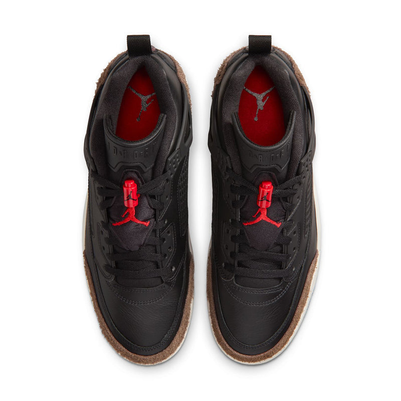 Pair of black sneakers with red Jumpman logo on tongues and red-lined interior