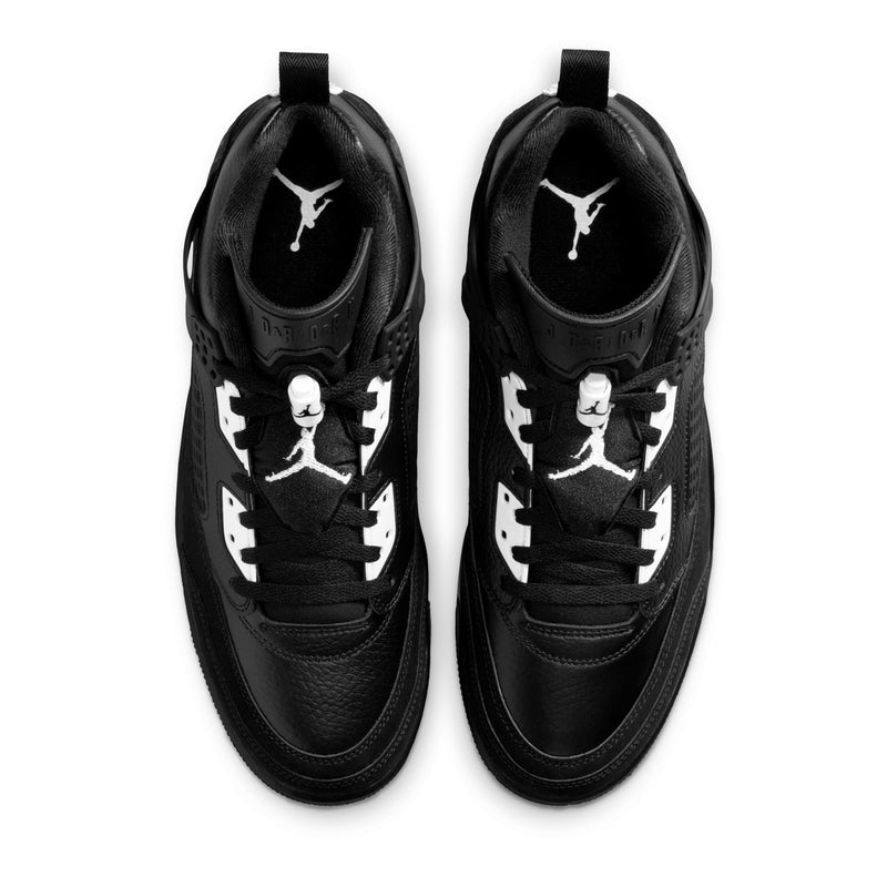 Men's black low-top sneakers from top view of laces and heel Jumpman logos.