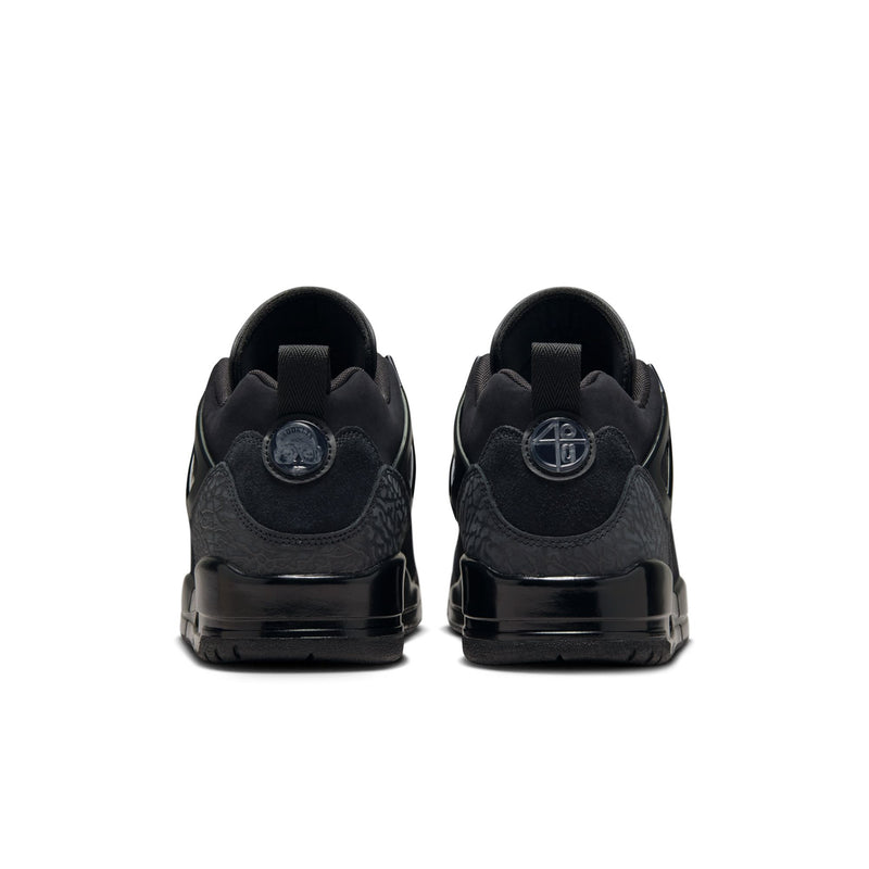 Black sneaker heels with pull tabs, padded collar, and logo patch detail