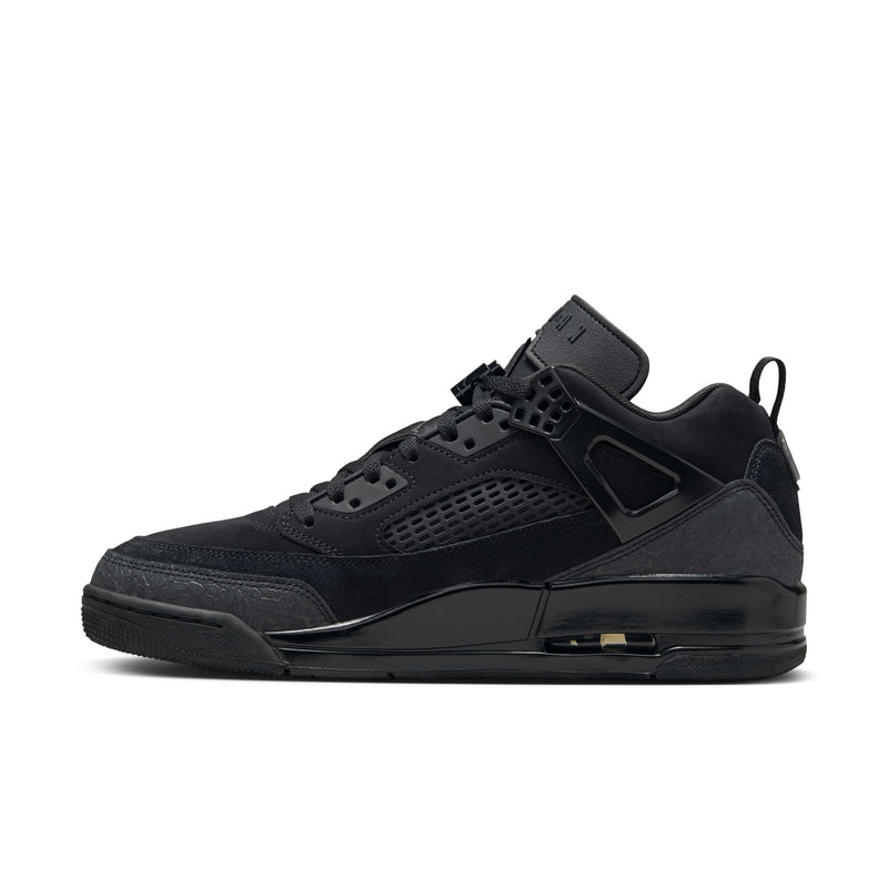 Black low-top sneaker side view with lace-up, strap detail, and air unit midsole
