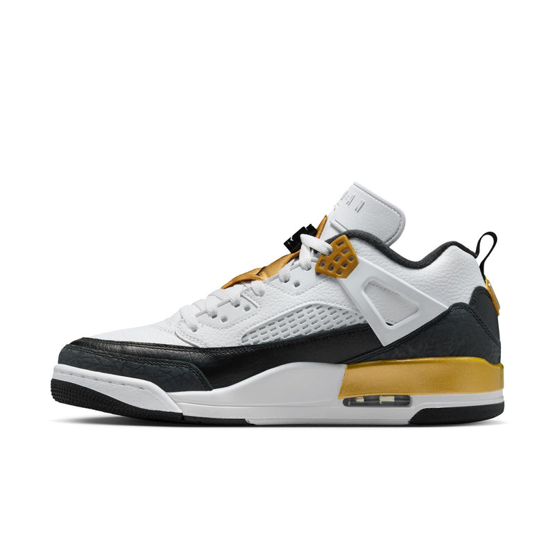 Men's low-top sneakers in white and black with metallic gold accents; lace-up side profile.